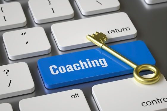 clavier reprenant une touche coaching et une clef