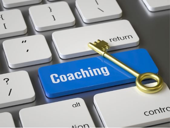 coaching clavier reprenant une touche coaching et une clef
